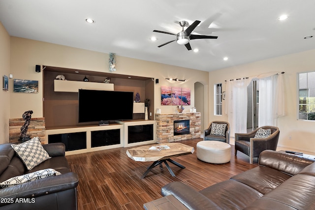26036 N 85th Dr, Peoria, AZ 85383 - living area with a ceiling fan, wood finished floors, recessed lighting, a fireplace, and arched walkways