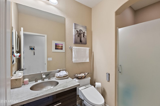 26036 N 85th Dr, Peoria, AZ 85383 - full bathroom with vanity, a stall shower, and toilet