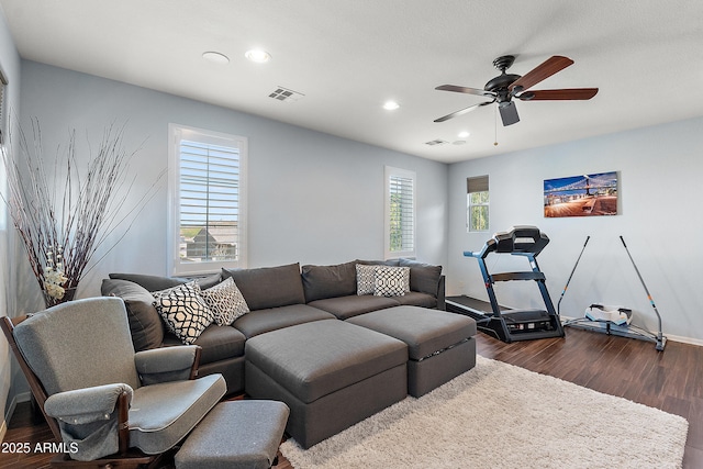 26036 N 85th Dr, Peoria, AZ 85383 - living room with dark wood-style floors, ceiling fan, recessed lighting, and baseboards