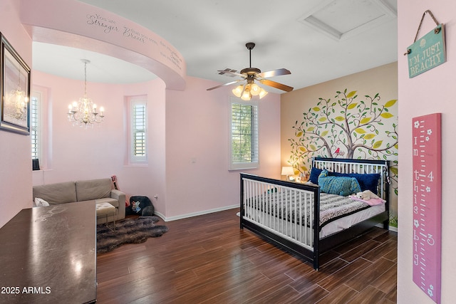26036 N 85th Dr, Peoria, AZ 85383 - bedroom featuring dark wood-style floors, baseboards, a chandelier, and ceiling fan