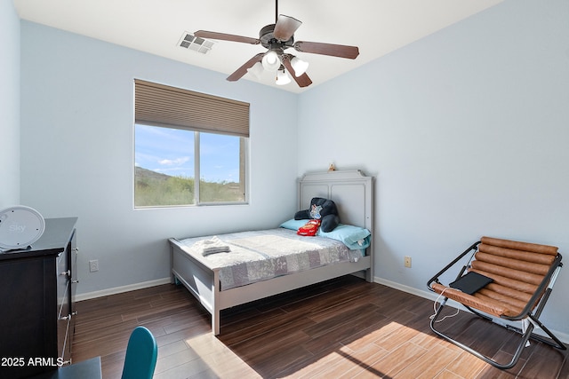 26036 N 85th Dr, Peoria, AZ 85383 - bedroom featuring wood finished floors, baseboards, and a ceiling fan