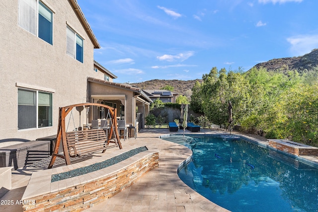 26036 N 85th Dr, Peoria, AZ 85383 - view of swimming pool with a mountain view, a patio area, and a fenced backyard