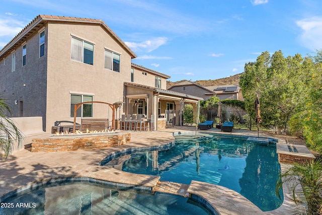 26036 N 85th Dr, Peoria, AZ 85383 - view of swimming pool with a pool with connected hot tub and a patio area
