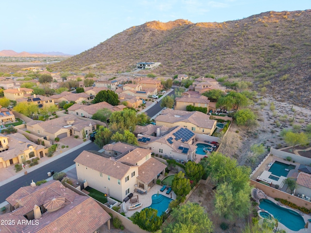 26036 N 85th Dr, Peoria, AZ 85383 - aerial perspective of suburban area with a mountainous background and a pool