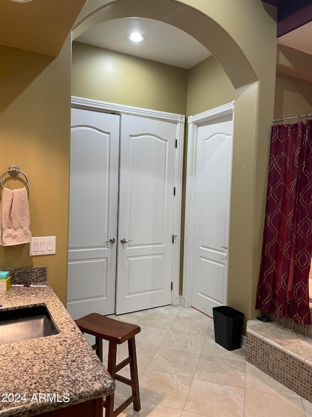 bathroom featuring tile floors