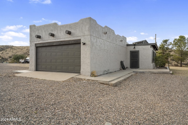 view of home's exterior with a garage