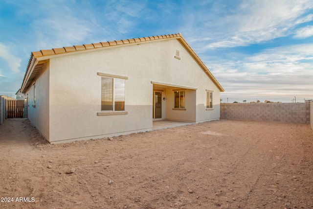 back of house featuring a patio