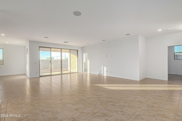 empty room featuring light tile patterned floors