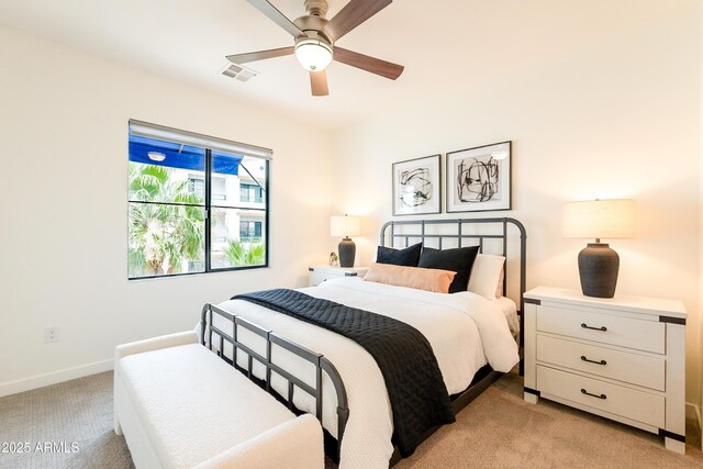 2511 W Queen Creek Rd Unit 325, Chandler, AZ 85248 - bedroom featuring light carpet and ceiling fan