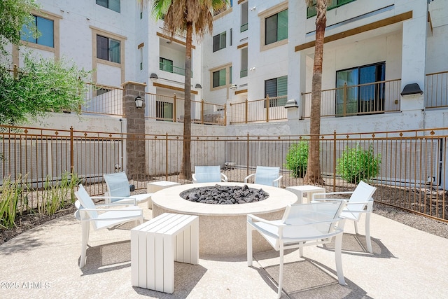 2511 W Queen Creek Rd Unit 325, Chandler, AZ 85248 - view of patio / terrace featuring a fire pit