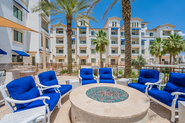 2511 W Queen Creek Rd Unit 325, Chandler, AZ 85248 - view of patio featuring a grill and a fire pit