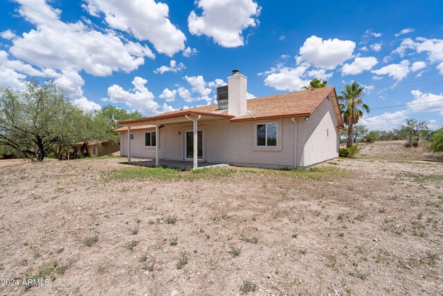 rear view of property with a patio