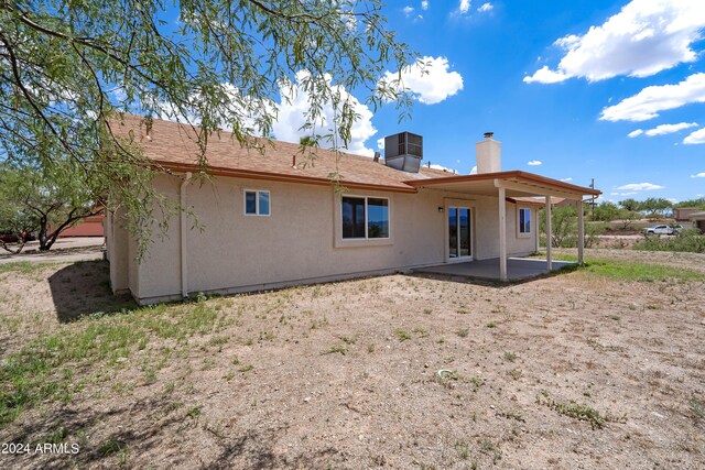 rear view of property featuring a patio