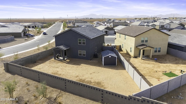 drone / aerial view featuring a mountain view