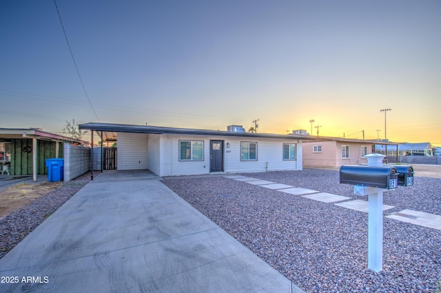 view of front facade with a carport