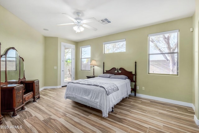 bedroom featuring ceiling fan and light wood-type flooring