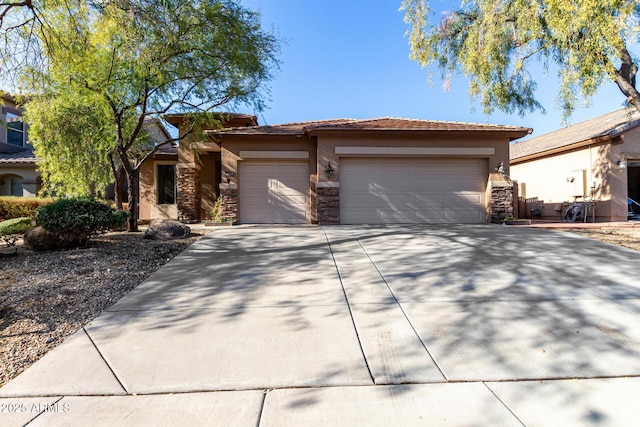 view of front of property featuring a garage