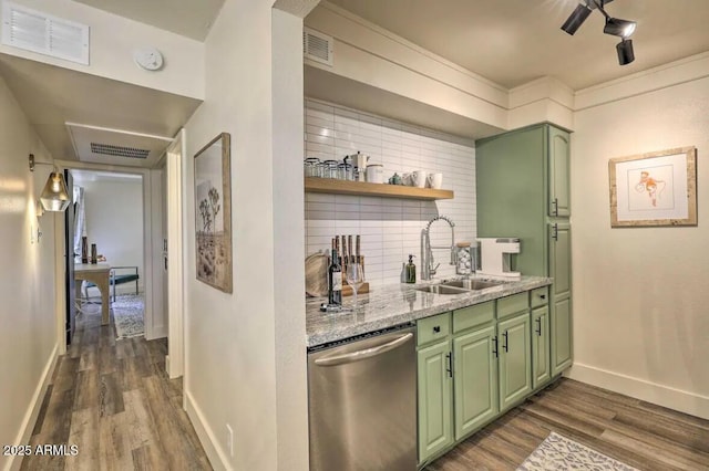 bar with dark wood-style floors, visible vents, decorative backsplash, stainless steel dishwasher, and a sink