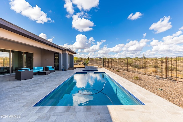 view of swimming pool featuring a patio, outdoor lounge area, a fenced backyard, and a pool with connected hot tub