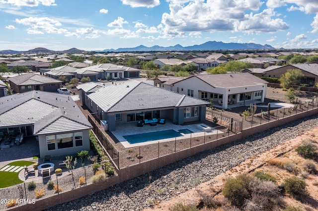 bird's eye view with a residential view and a mountain view