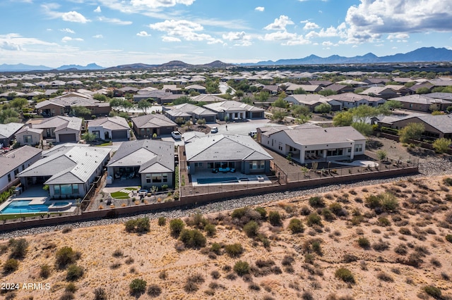 birds eye view of property featuring a residential view and a mountain view