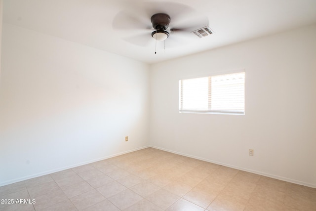 8055 W Sanna St, Peoria, AZ 85345 - spare room featuring a ceiling fan and baseboards
