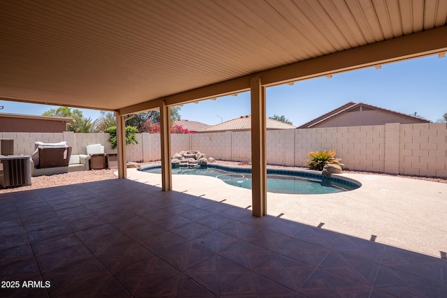 8055 W Sanna St, Peoria, AZ 85345 - view of swimming pool featuring a patio, a fenced backyard, and central air condition unit