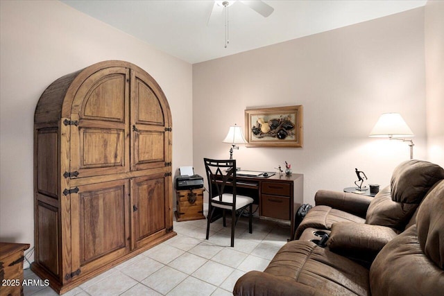 office area with ceiling fan and light tile patterned flooring