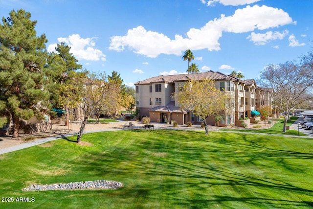 surrounding community with a playground and a yard