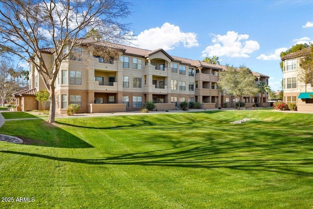 view of community with a lawn