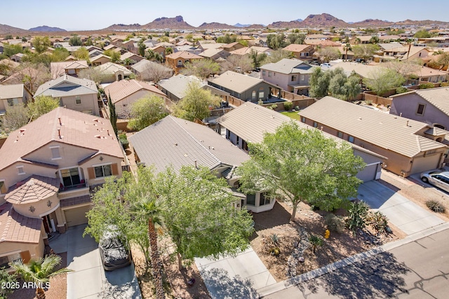 drone / aerial view featuring a mountain view and a residential view