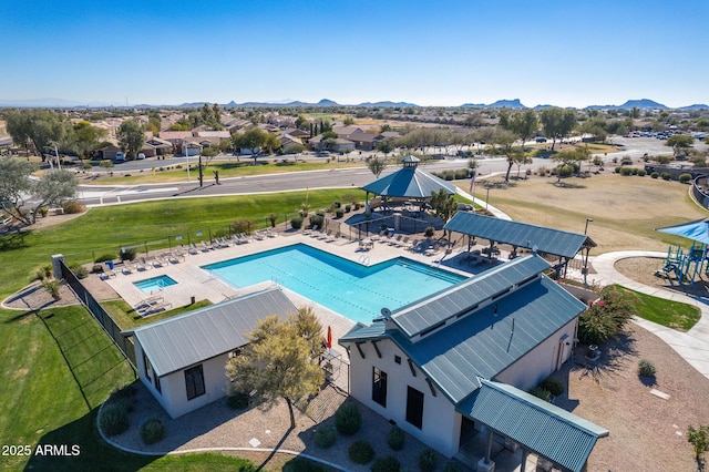 drone / aerial view with a mountain view and a residential view