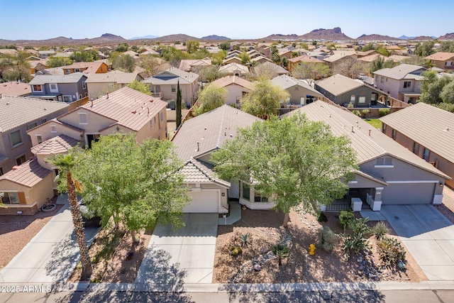 bird's eye view featuring a mountain view and a residential view