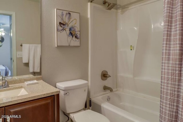 bathroom featuring toilet, vanity, and shower / bathtub combination with curtain