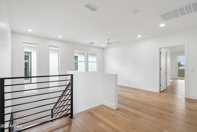 5537 E Earll Dr, Phoenix, AZ 85018 - spare room with light wood-style flooring, recessed lighting, healthy amount of natural light, baseboards, and a ceiling fan