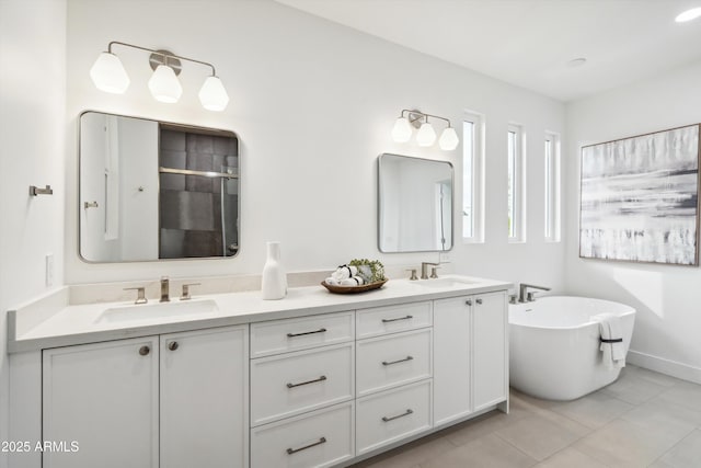5537 E Earll Dr, Phoenix, AZ 85018 - full bathroom with a shower stall, double vanity, a freestanding bath, and tile patterned floors