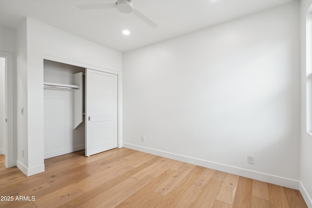 5537 E Earll Dr, Phoenix, AZ 85018 - unfurnished bedroom with baseboards, light wood finished floors, a closet, recessed lighting, and a ceiling fan