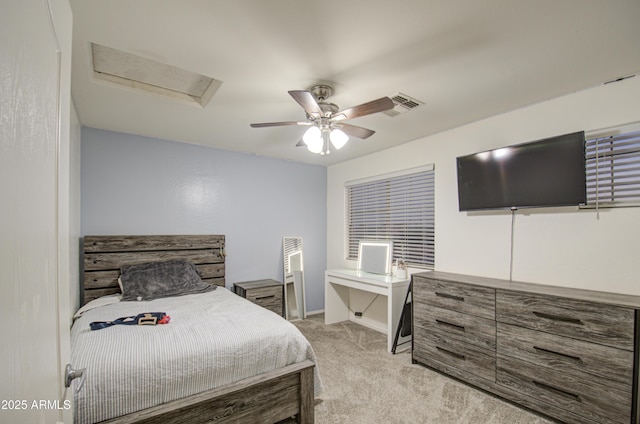 carpeted bedroom with ceiling fan