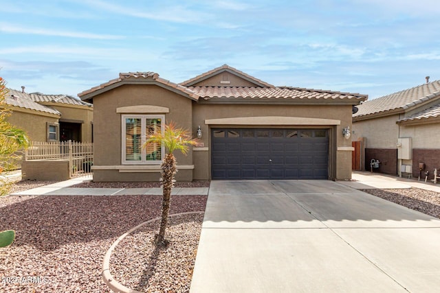 view of front of property featuring a garage