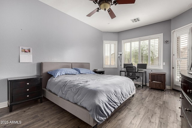 bedroom with hardwood / wood-style flooring and ceiling fan