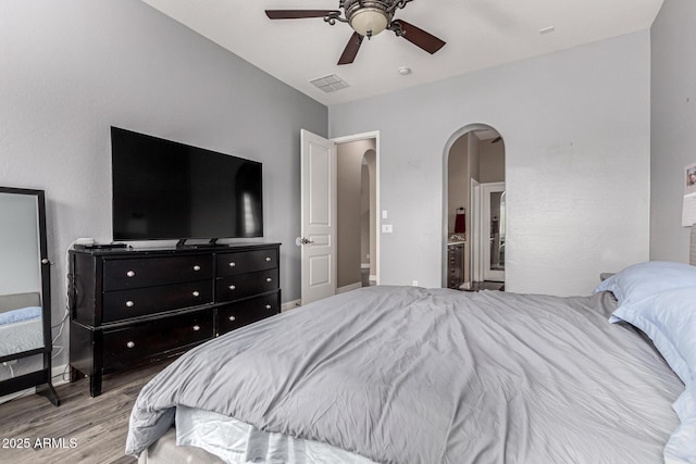 bedroom with light hardwood / wood-style floors and ceiling fan