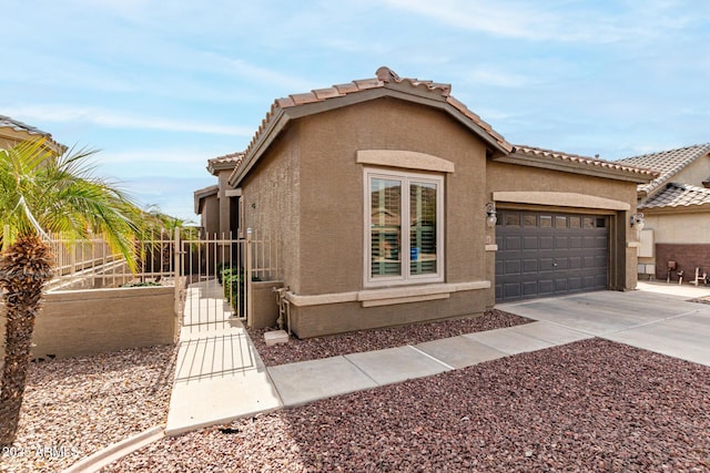 view of front of home featuring a garage