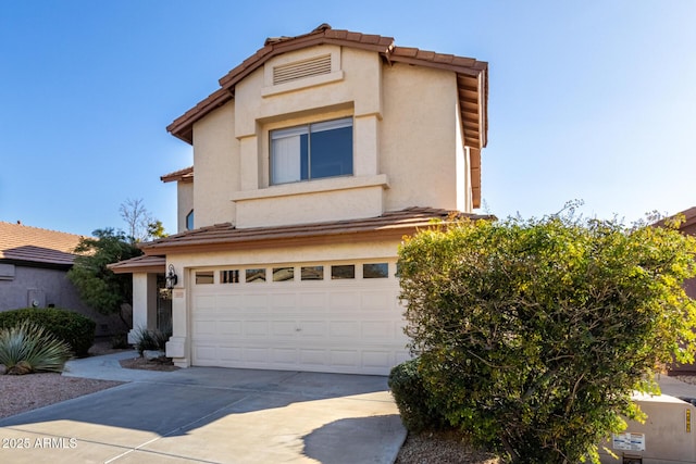 view of front of property featuring a garage