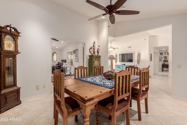 dining area with light tile patterned floors, visible vents, a ceiling fan, high vaulted ceiling, and recessed lighting