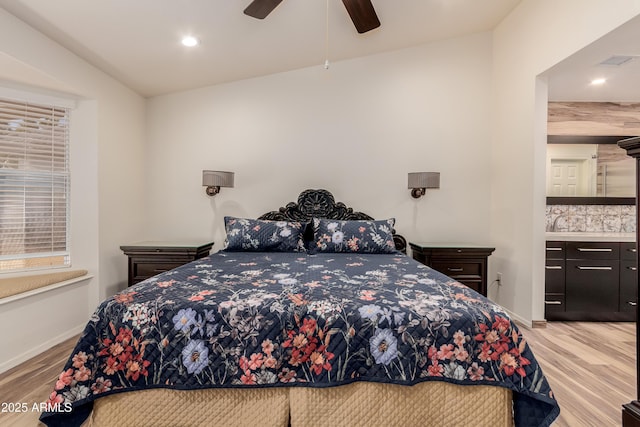 bedroom featuring baseboards, visible vents, wood finished floors, and recessed lighting