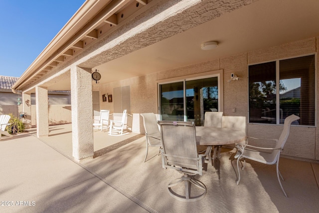 view of patio with outdoor dining space