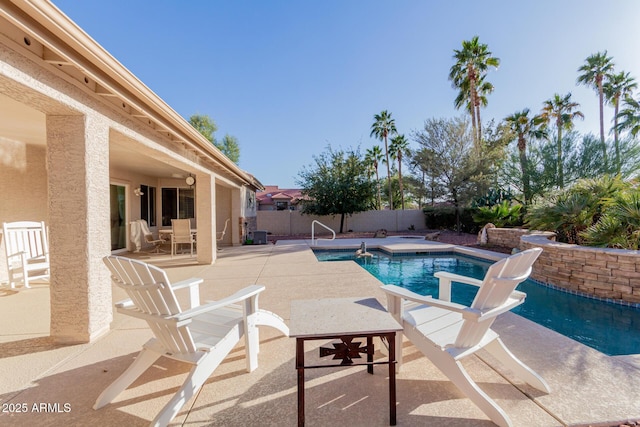 view of pool with a patio area, a fenced backyard, and a fenced in pool