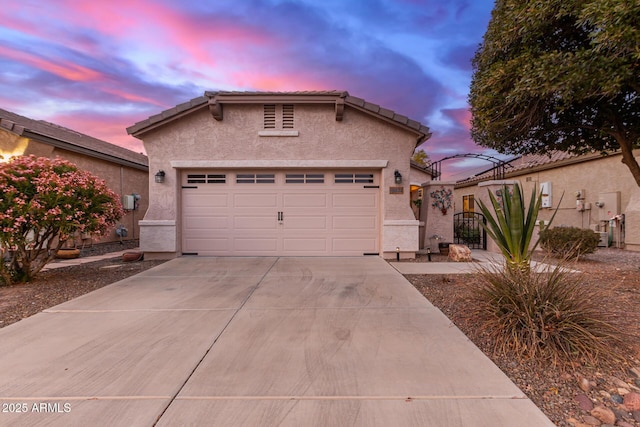 view of front of home featuring a garage