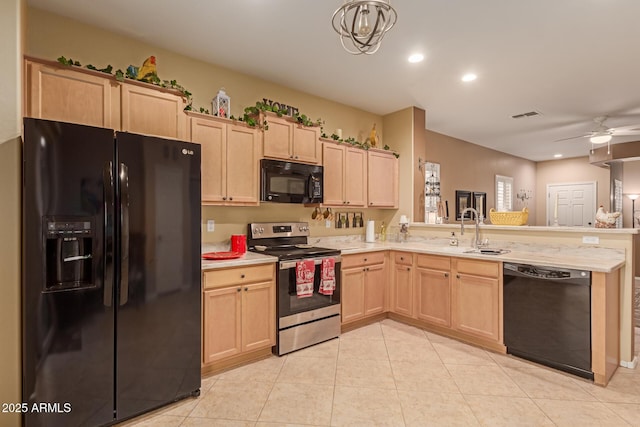 kitchen featuring black appliances, light brown cabinetry, sink, and ceiling fan