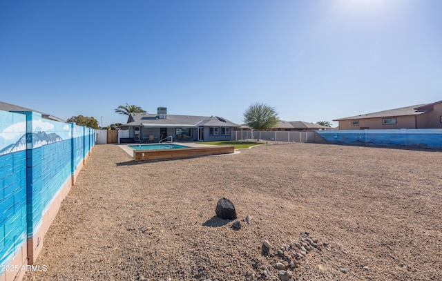 view of community with a swimming pool and a patio